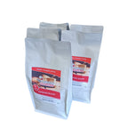 Five packages of African Roasters Espresso Blend coffee on a white background