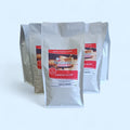 Bulk coffee bags with 'African Roasters' label on a white background